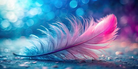 Obraz premium Feather with pink and blue colors on blurry background, feather, pink, blue, colorful, soft, delicate, pastel, vibrant, gradient