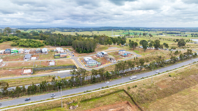 Drone aerial photograph of construction and infrastructure development in the fast growing suburb of Oran Park in the high density development region of western Sydney, NSW Australia.