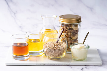 Many kinds of oil - white marble background - for healthcare 5