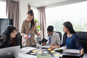 Business asian Multicultural businesspeople working project  working together in office conference ideas in startup at office Diversity leadership and business people
