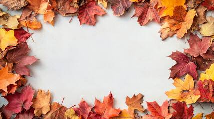 A frame of bright autumn leaves surrounds an open white space, perfect for a seasonal message. Vibrant shades of red, orange, and yellow maple leaves create a cozy, rustic border, with subtle