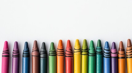 Top view of open crayons and art supplies on white background, vibrant theme with room for Children Day message