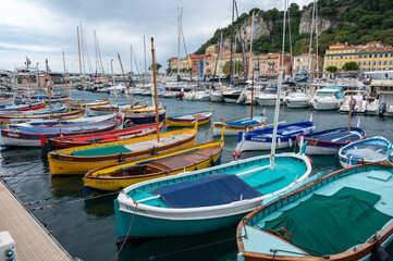 Obraz premium Traditional colorful fishing boats, called pointu in French. in Nice Port, Nice, France on sunny summer day.