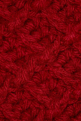 close-up of grandma's bright red basket weave blanket, crocheted or knitted, grandma's house, cozy and warm, macro background