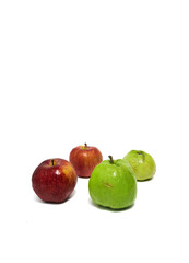 Fresh red apple and guava on isolated white background