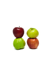 Fresh red apple and guava on isolated white background