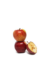Close up of fresh apple with slices on isolated white background