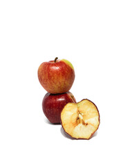 Close up of fresh apple with slices on isolated white background