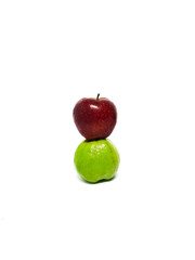 Fresh red apple and guava on isolated white background