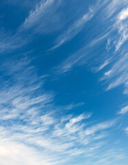 Serene Blue Sky Adorned with Wispy Cirrus Clouds, a Breathtaking View