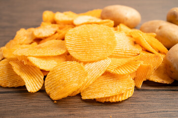 Potato chips , delicious BBQ seasoning spicy for crips, thin slice deep fried snack fast food.