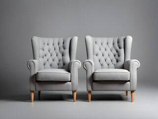Comfortable armchairs on grey background
