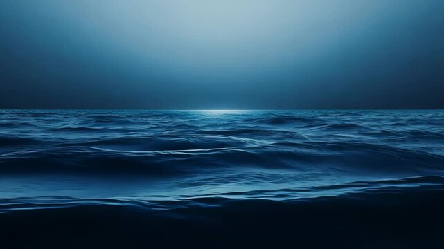 Deep blue ocean waves roll beneath a dark sky, illuminated by ethereal moonlight. Rhythmic water movements create a hypnotic pattern across the vast seascape. 