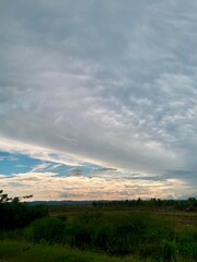 Sunset with clouds over the field. Samana, Dominican Republic
