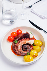 Traditional French octopus with baked potatoes