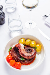 Traditional French octopus with baked potatoes