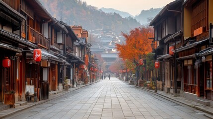 Traditional Japanese Street with Red Lanterns and Autumn Foliage