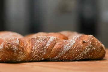 A baguette bread on a wooden table