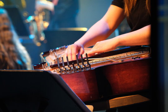 Playing the traditional Finnish instrument kantele