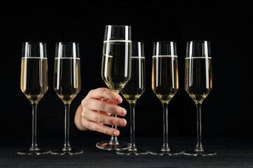 Champagne glasses on a black background