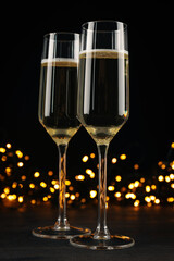 Champagne glasses on a black background