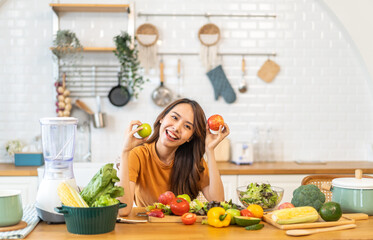Portrait of beauty body slim healthy asian woman big smile cooking and preparing vegan food healthy holding apple, green apple, dental, teeth, fruit in kitchen at home.Diet.Fitness, healthy food