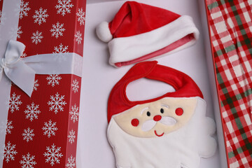Santa Clause costume hat set for baby , pet on a red gift box