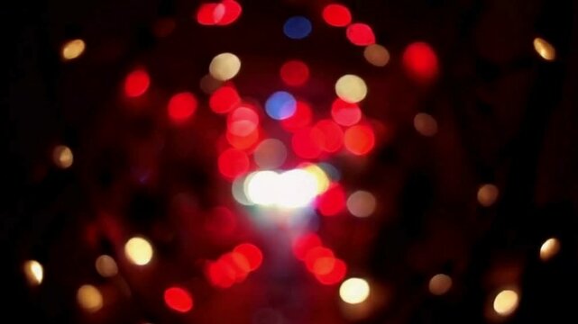 Vibrant Display of Colourful Booker Lights with Red, Blue, and White Hues on Video Background