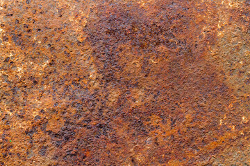 The texture of rusty iron. A rusty iron sheet. Old metal close-up.