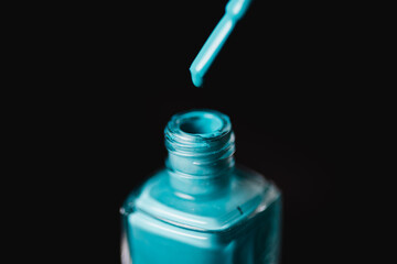 Baby blue nail polish closeup