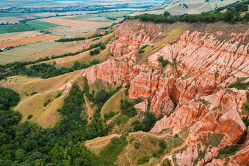 Red rocky slopes Rapa Rosie is a protected geological and floristic reservation area near Sebes...