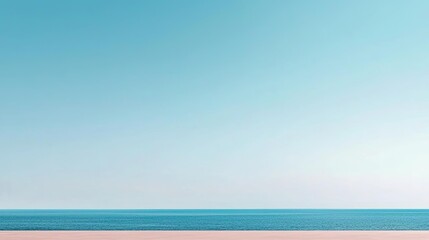 Fototapeta premium Serene beach view with turquoise water and clear sky, perfect for relaxation.