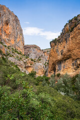 Pasarelas del Vero, walkways and footbridges along a scenic gorge with turquoise water in Alquézar, Huesca, Spain