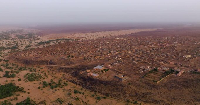 Aerial View Of Desert Landscape On Foggy Sunrise In Town Of Ouadane, Mauritania.