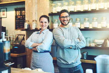 Crossed arms, team and portrait of baristas in cafe with confidence for beverage industry. Group, pride and servers from London with smile for hospitality career in shop with professional service.