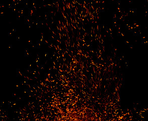 The image is a black and white photo of a fire with a lot of smoke and ash