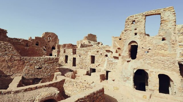 Ruins of ghorfas in ancient Ksar Beni Barka Berber settlement, Tataouine, Tunisia