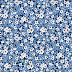 Colorful ditsy seamless pattern. Vector floral wallpaper with flowers and leaves. Gentle botanical background. Print for fabric, paper, kids clothes and accessories