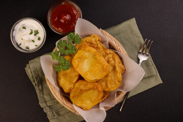 Allo Pakora or Pakoda is Indian Potatoes Fritters.  