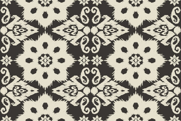 Ikat paisley embroidery on the fabric in Indonesia, India and Asian countries.geometric ethnic oriental seamless pattern.Aztec style. illustration. design for texture, fabric,clothing,wrapping,carpet.