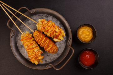 Delicious Crunchy Korean Style Chunky Potato Corndogs and Mozarella Corndogs. 