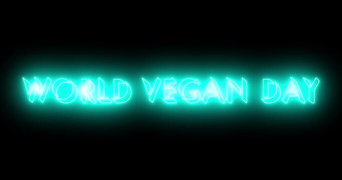 World Vegan Day text animation in 4K. Neon World Vegan Day text with glowing neon text is perfect for online shops, blogs, web, cafes, advertising, and hotels. Technology video material animation. 
