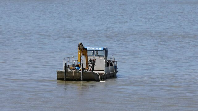 Boat with Crane on Blaye Waters