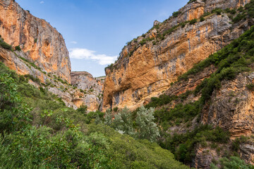 Pasarelas del Vero, walkways and footbridges along a scenic gorge with turquoise water in Alquézar, Huesca, Spain