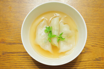 Boiled dumplings, one of China's traditional home-style dishes