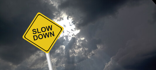 slow down sign on white background