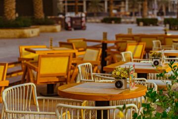 tables and chairs in outdoor restaurant