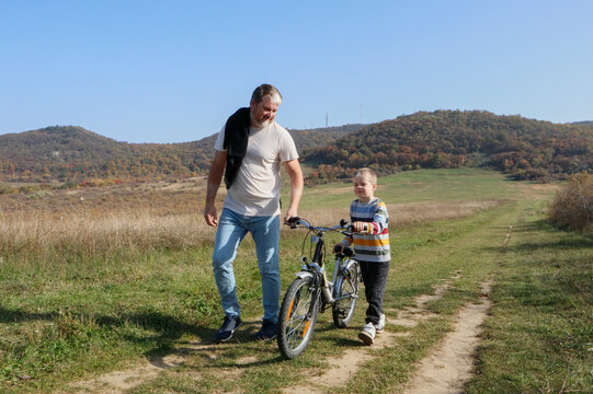 Fun in the sun: dad and son share a bicycle adventure