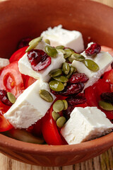tomato, pumpkin seeds and cheese salad