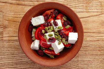 tomato, pumpkin seeds and cheese salad